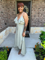 A Knit Top With Deep V Neckline And Yoke Design