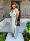 A Knit Top With Deep V Neckline And Yoke Design